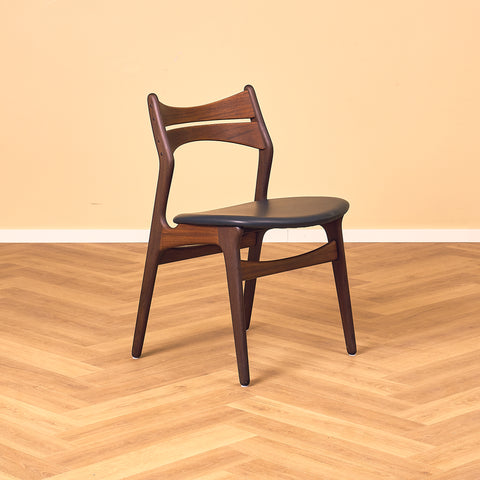 Danish dining chairs in walnut and teak by Erik Buch for Chr. Christensen Møbelfabrik, model 310