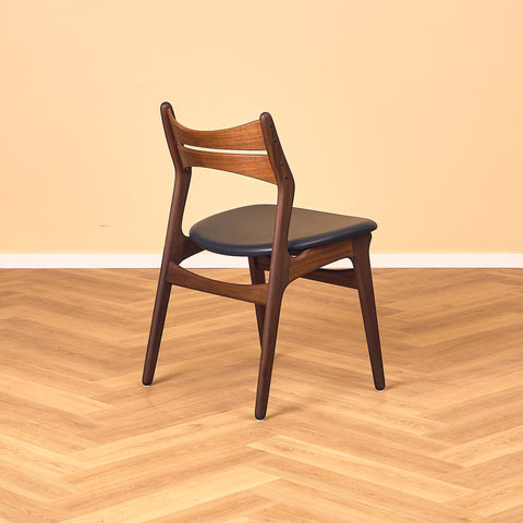 Danish dining chairs in walnut and teak by Erik Buch for Chr. Christensen Møbelfabrik, model 310