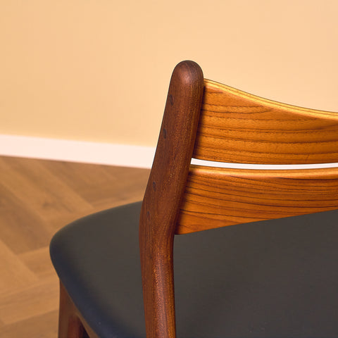 Danish dining chairs in walnut and teak by Erik Buch for Chr. Christensen Møbelfabrik, model 310