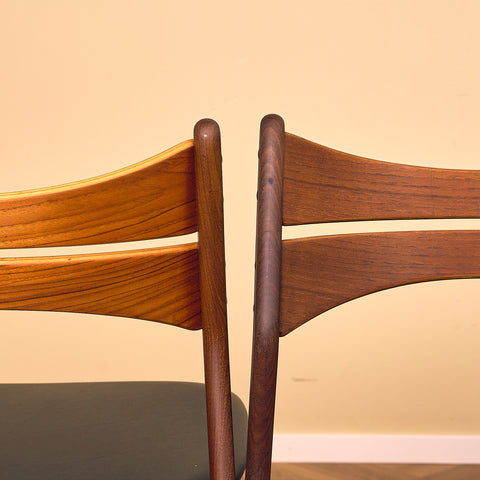 Danish dining chairs in walnut and teak by Erik Buch for Chr. Christensen Møbelfabrik, model 310