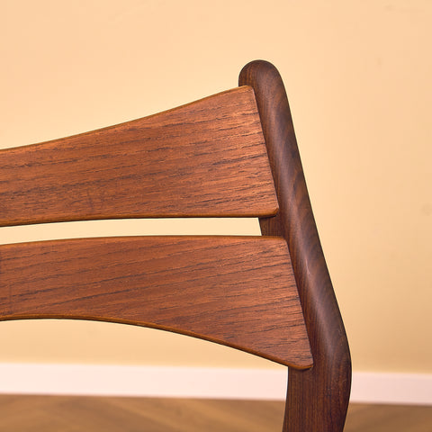 Danish dining chairs in walnut and teak by Erik Buch for Chr. Christensen Møbelfabrik, model 310
