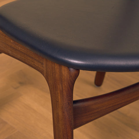Danish dining chairs in walnut and teak by Erik Buch for Chr. Christensen Møbelfabrik, model 310