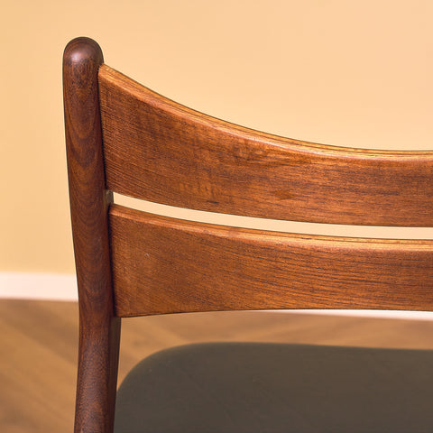 Danish dining chairs in walnut and teak by Erik Buch for Chr. Christensen Møbelfabrik, model 310