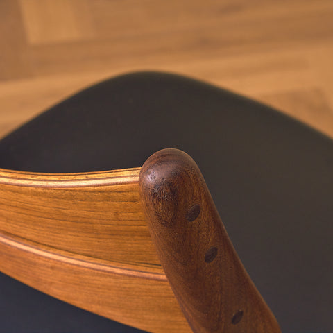 Danish dining chairs in walnut and teak by Erik Buch for Chr. Christensen Møbelfabrik, model 310