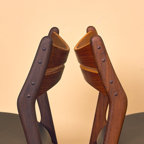 Danish dining chairs in walnut and teak by Erik Buch for Chr. Christensen Møbelfabrik, model 310