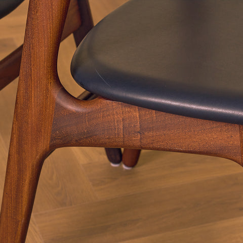 Danish dining chairs in walnut and teak by Erik Buch for Chr. Christensen Møbelfabrik, model 310