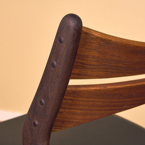 Danish dining chairs in walnut and teak by Erik Buch for Chr. Christensen Møbelfabrik, model 310