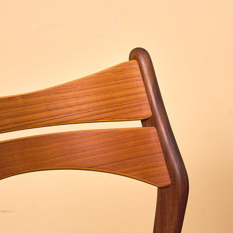 Danish dining chairs in walnut and teak by Erik Buch for Chr. Christensen Møbelfabrik, model 310