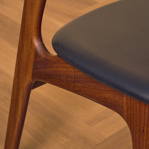 Danish dining chairs in walnut and teak by Erik Buch for Chr. Christensen Møbelfabrik, model 310