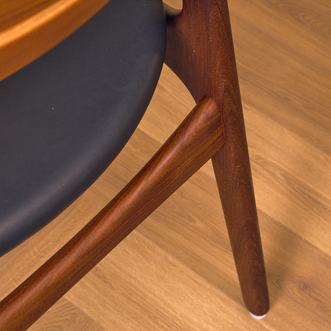 Danish dining chairs in walnut and teak by Erik Buch for Chr. Christensen Møbelfabrik, model 310