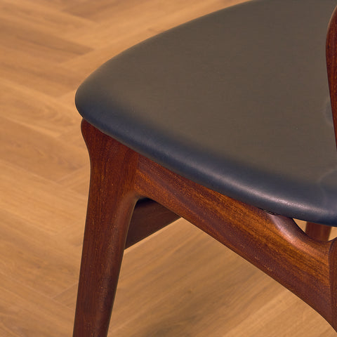 Danish dining chairs in walnut and teak by Erik Buch for Chr. Christensen Møbelfabrik, model 310
