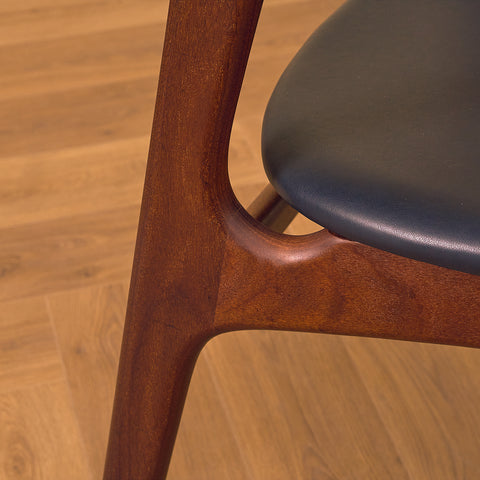 Danish dining chairs in walnut and teak by Erik Buch for Chr. Christensen Møbelfabrik, model 310