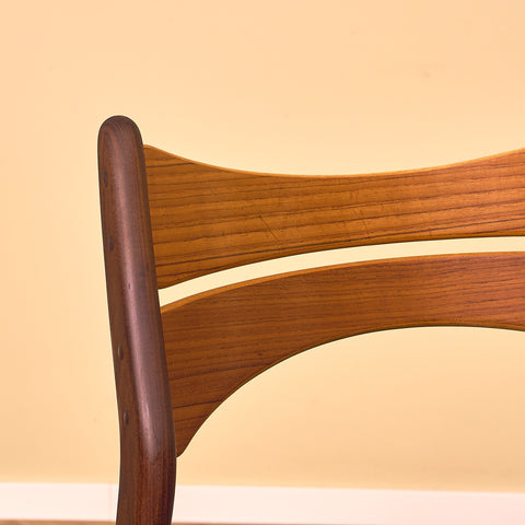 Danish dining chairs in walnut and teak by Erik Buch for Chr. Christensen Møbelfabrik, model 310