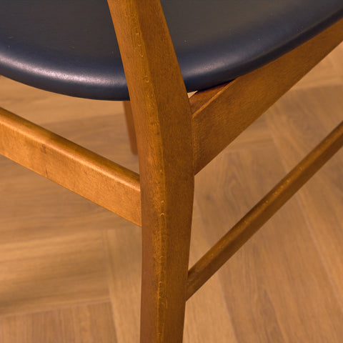 Dining chairs in teak & beech by Farstrup, model 210