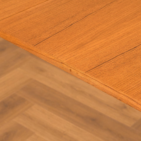 Danish dining table with 4 extensions in teak "Arne Vodder style"