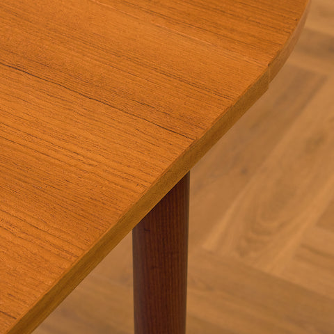 Danish dining table with 4 extensions in teak "Arne Vodder style"