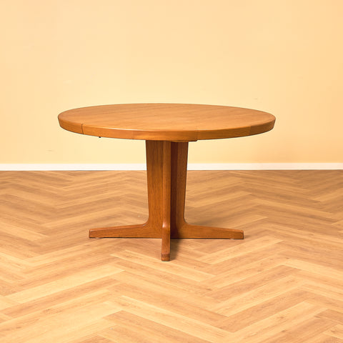 Danish round dining table in teak