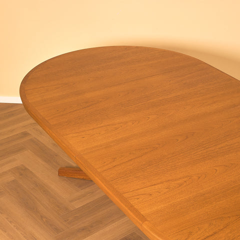 Danish round dining table in teak