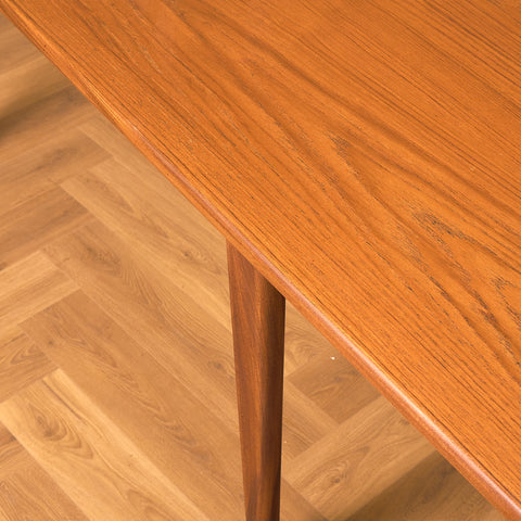 Swedish rectangular dining table in teak and walnut