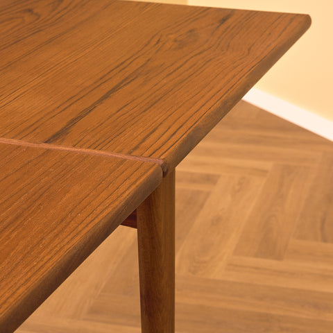 Swedish rectangular dining table in teak and walnut