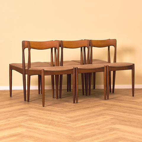 Danish dining chairs in teak and walnut by Arne Vodder for Vamo Søderborg