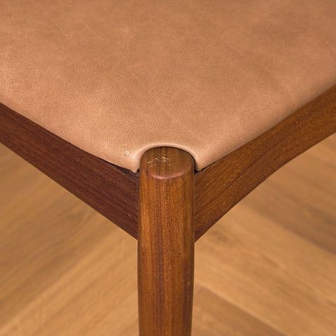 Danish dining chairs in teak and walnut by Arne Vodder for Vamo Søderborg