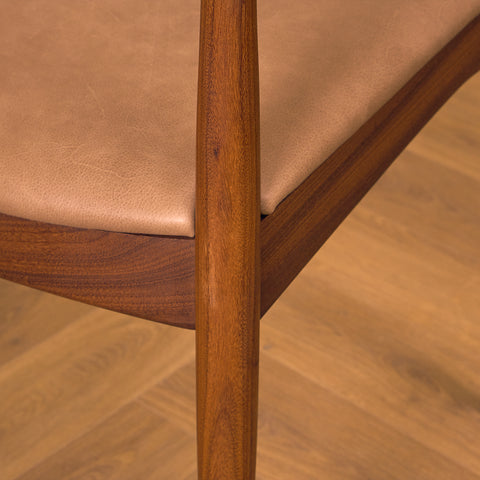 Danish dining chairs in teak and walnut by Arne Vodder for Vamo Søderborg