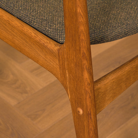 Danish dining chairs in oak by Johannes Andersen for Uldum Mobelfabrk