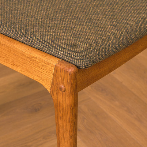 Danish dining chairs in oak by Johannes Andersen for Uldum Mobelfabrk