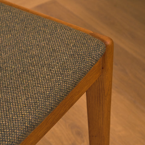 Danish dining chairs in oak by Johannes Andersen for Uldum Mobelfabrk