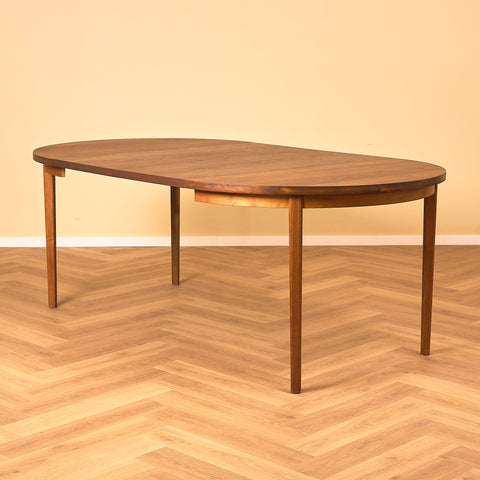Swedish round dining table in teak/walnut