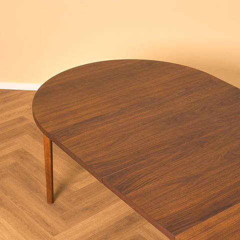 Swedish round dining table in teak/walnut