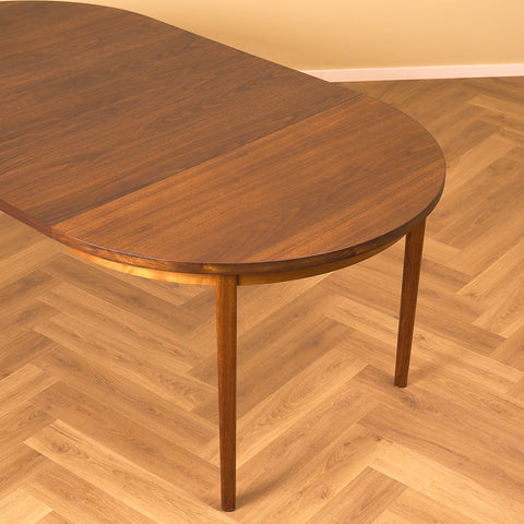 Swedish round dining table in teak/walnut