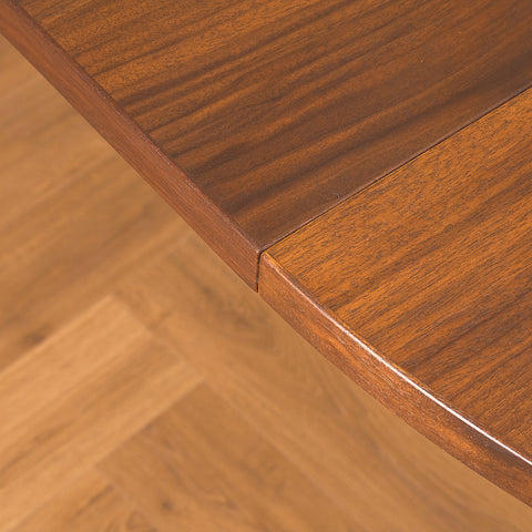 Swedish round dining table in teak/walnut