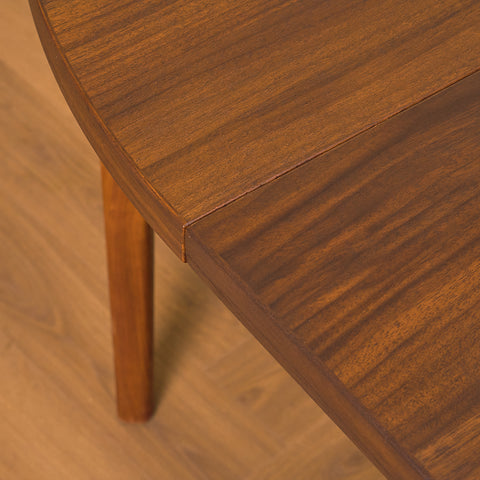 Swedish round dining table in teak/walnut