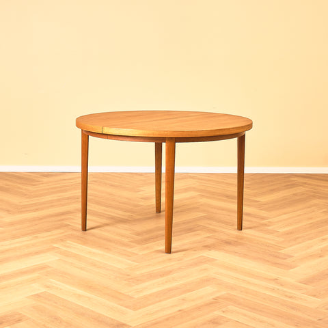 Swedish round dining table in teak