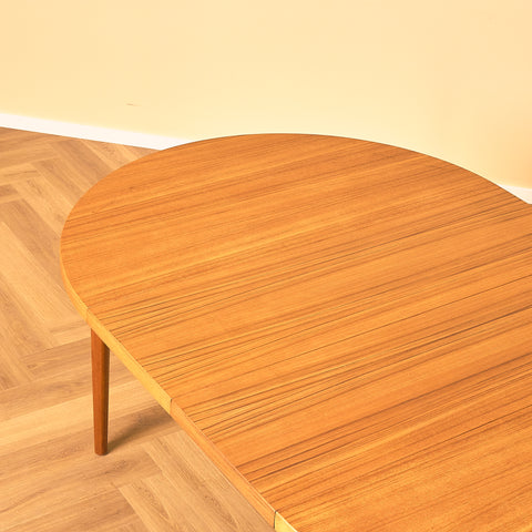Swedish round dining table in teak