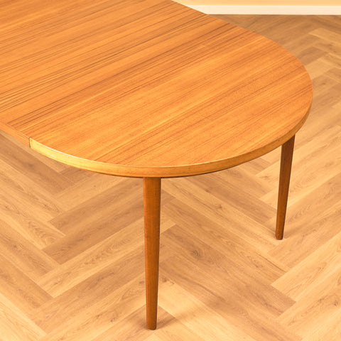 Swedish round dining table in teak