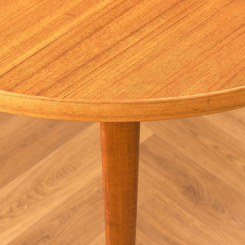 Swedish round dining table in teak