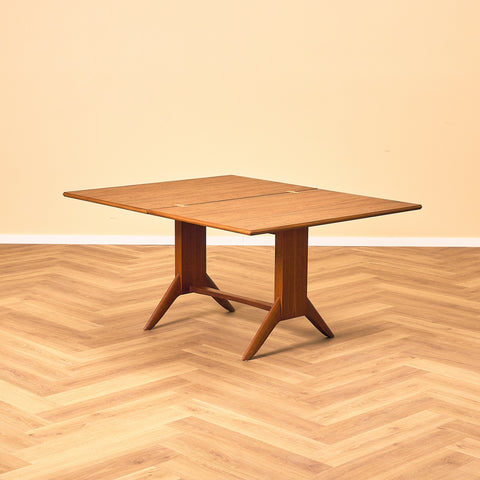 German extendable coffee table/dining table in teak by Wilhelm Renz
