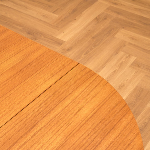 Danish dining table with 4 extensions in teak "Arne Vodder style"