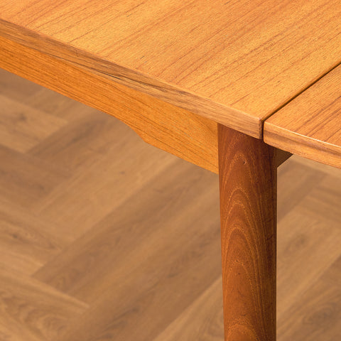 Danish dining table with 4 extensions in teak "Arne Vodder style"