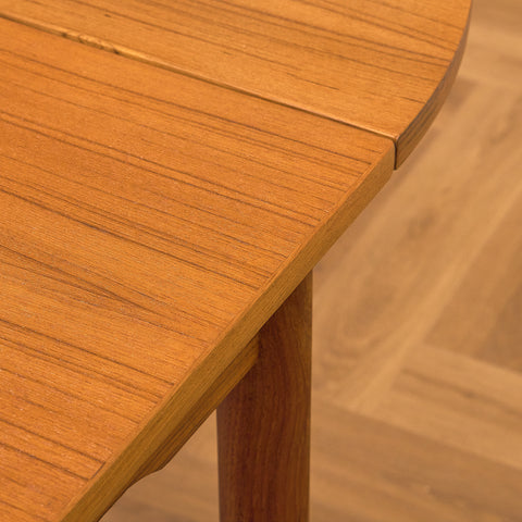 Danish dining table with 4 extensions in teak "Arne Vodder style"