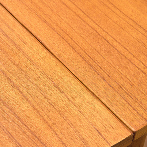Danish dining table with 4 extensions in teak "Arne Vodder style"
