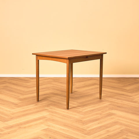 Danish dining table in teak and oak "Arne Vodder style"