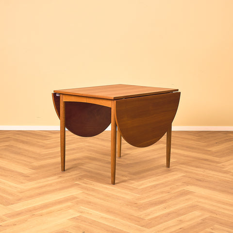 Danish dining table in teak and oak "Arne Vodder style"