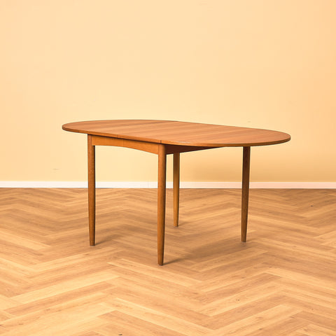 Danish dining table in teak and oak "Arne Vodder style"