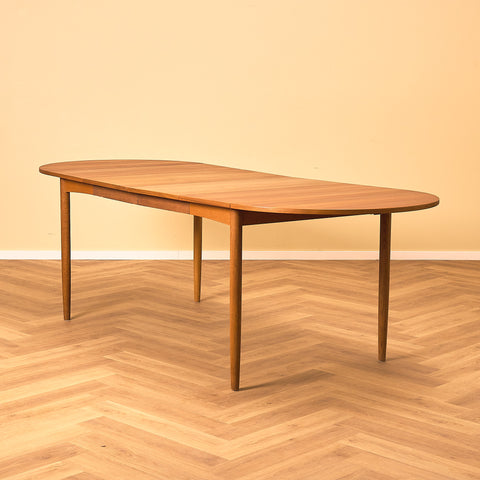 Danish dining table in teak and oak "Arne Vodder style"