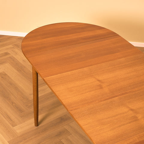 Danish dining table in teak and oak "Arne Vodder style"