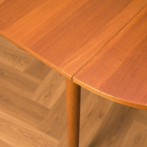 Danish dining table in teak and oak "Arne Vodder style"